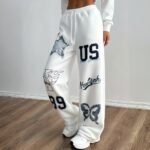 Women’s White Jogger Pants with Graphic Print – Urban Streetwear - Image 2