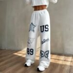 Women’s White Jogger Pants with Graphic Print – Urban Streetwear
